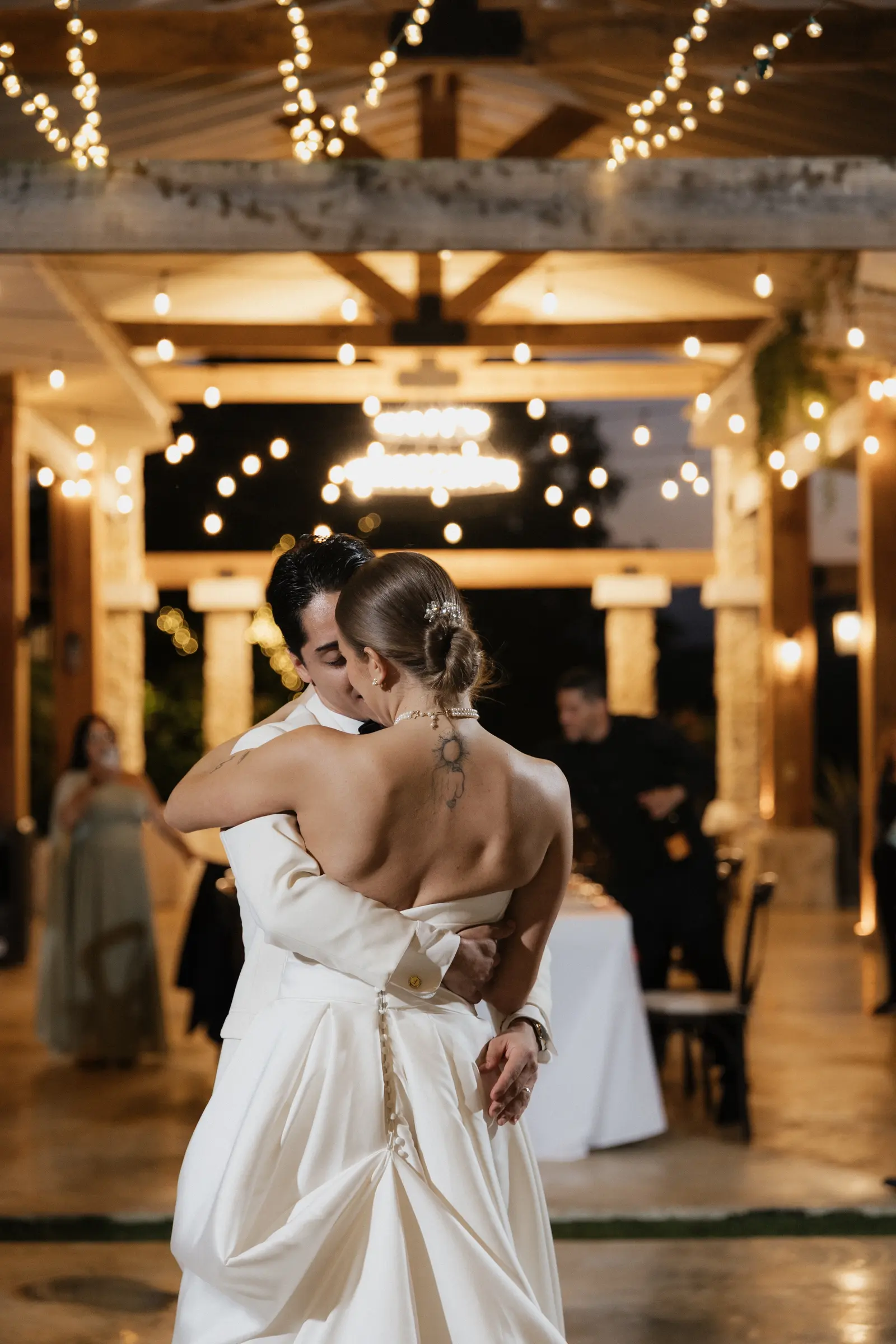 Bride and groom dancing together at their reception