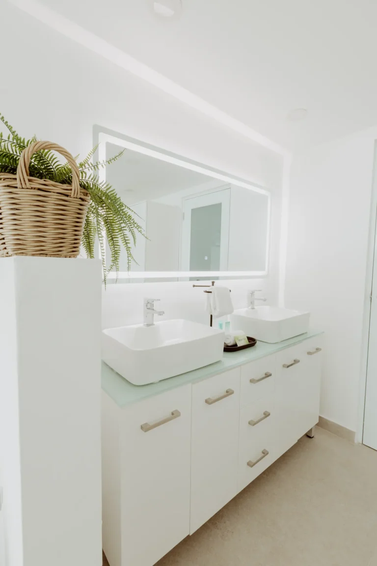 Modern white bathroom with a double vanity and mirror